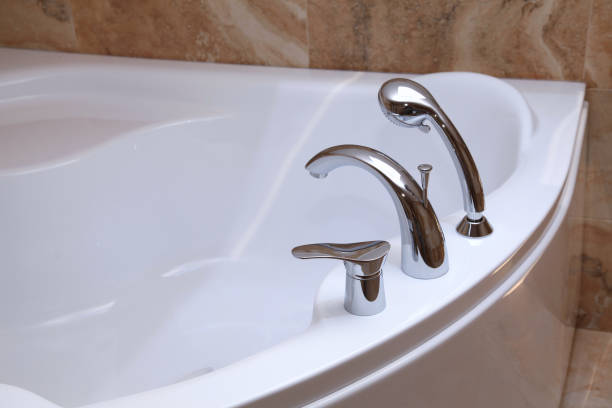 istock Bathtub faucet in modern bathroom. 867116916