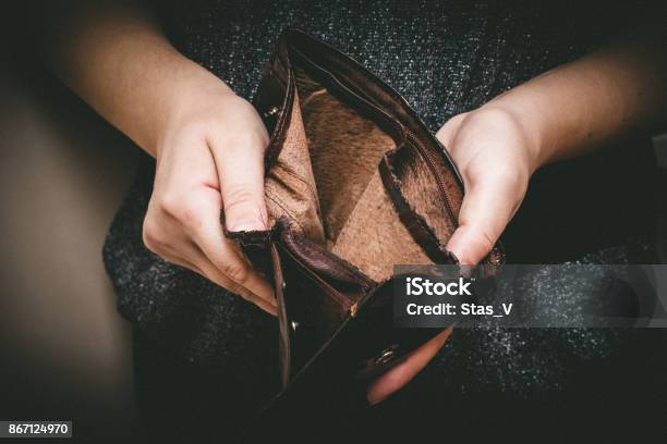 Old Empty Wallet In The Hands Vintage Empty Purse In Hands Of Women Poverty Concept Retirement Special Toning Stock Photo - Download Image Now