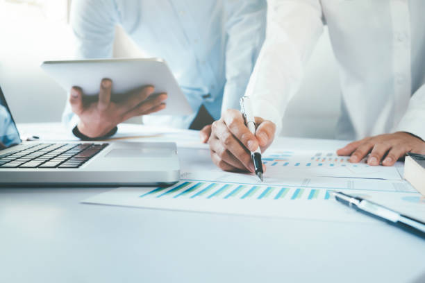 istock Investor working new startup project. Business team present. 867128678