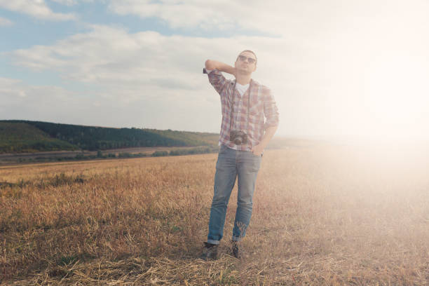 istock Attractive male photographer outdoors at sunset 867132852
