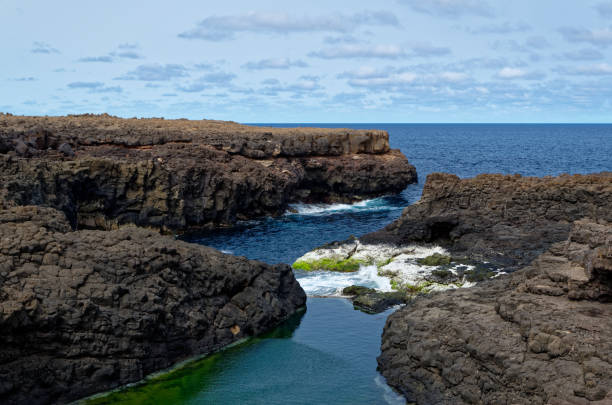 istock Rock face and cliffs and on the Atlantic ocean coast. Cape Verde, island Sal. 867133304
