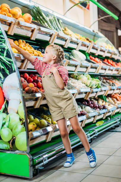 istock kid in grocery shop 867153804