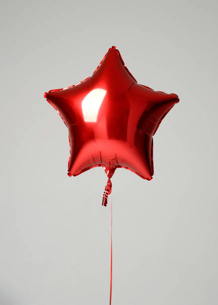 istock Single red big star metallic balloon object for birthday 867162836