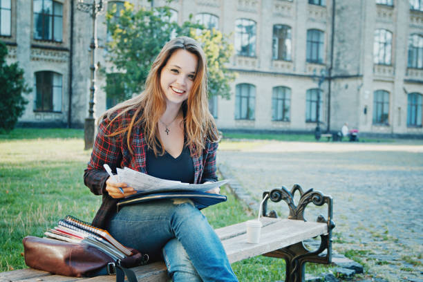 istock the student is sitting on the bench 867178780