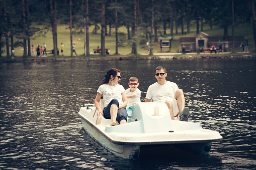 Family on the pedal boat