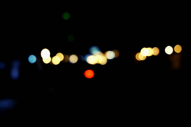 istock Abstract urban night light bokeh, defocused background 867183580