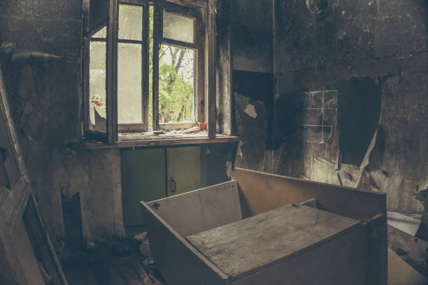 istock Burned interiors of apartment building room after fire 867189520