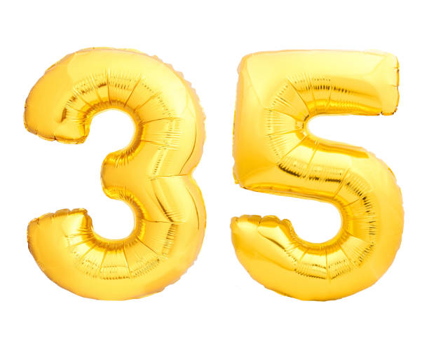 Golden number 35 thirty five made of inflatable balloon Golden number 35 thirty five of inflatable balloon isolated on white background number 35 stock pictures, royalty-free photos & images