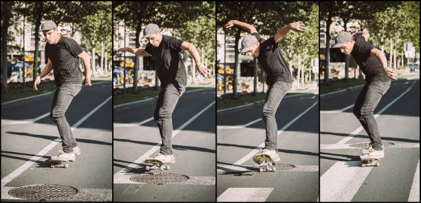 Group of friends hangout at the city street.Female sitting on skate board while friends pushing her from behind.
