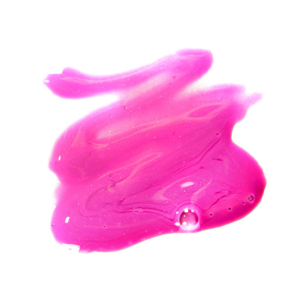 istock Pink liquid lipstick smear on white background 867196438