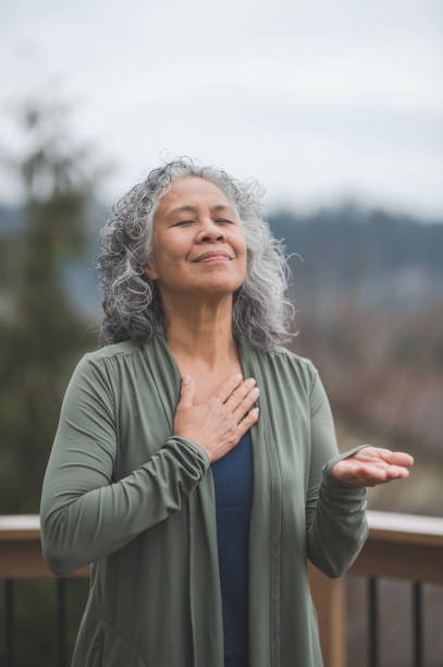 istock Hawaiian woman doing yoga pose outside 867197228