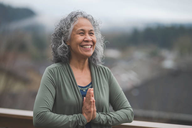 istock Hawaiian woman doing yoga pose outside 867197242