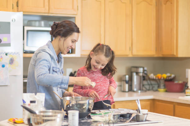 istock Mom and daughter baking day! 867199400
