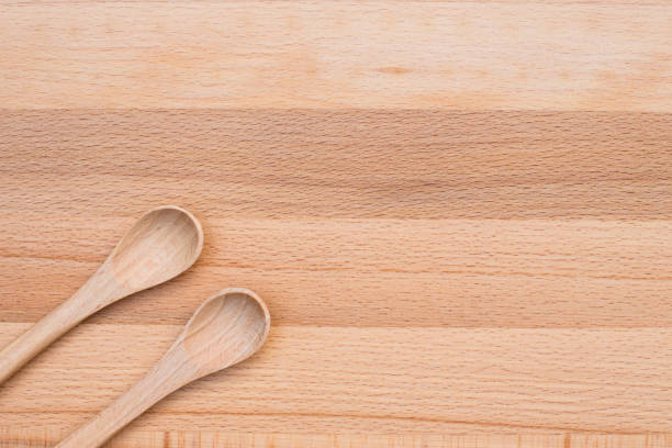 istock Wooden spoon on wooden background 867199624