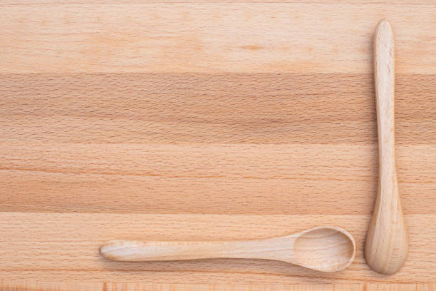 istock Wooden spoon on wooden background 867202518