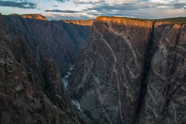 istock Sunrise on Painted Cliff in Black Canyon National Park 867202656