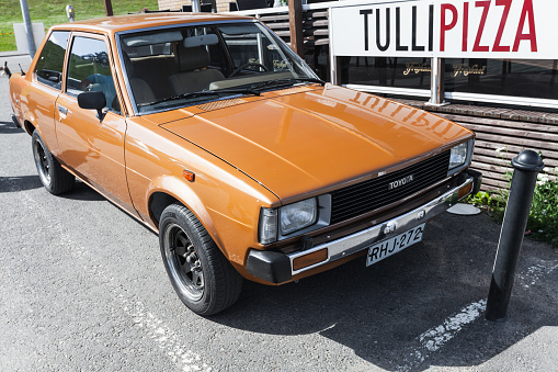 Lappeenranta, Finland - July 1, 2017: Orange brown Toyota Corolla stands on a parking lot. Type E70, fourth generation produced in 1979â1983 by Toyota Motor Corporation