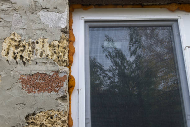 istock Installation with a construction foam of modern pvc window 867209958