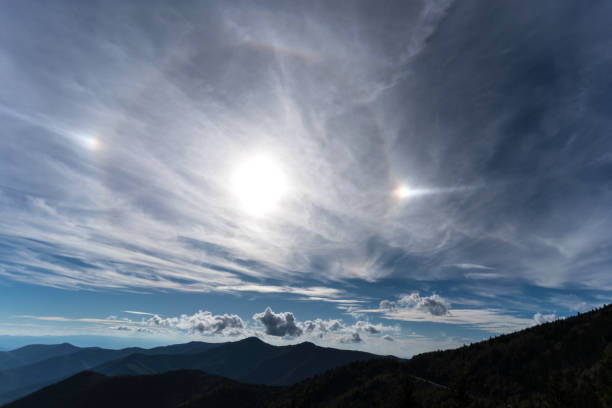 Sundog in the mountains A sundog over the Blue Ridge Mountains on a warm Autumn day in North Carolina. sundog stock pictures, royalty-free photos & images