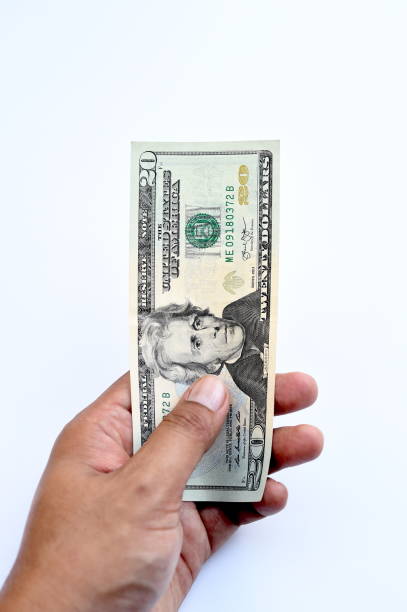istock close up of banknote on hand 867225718