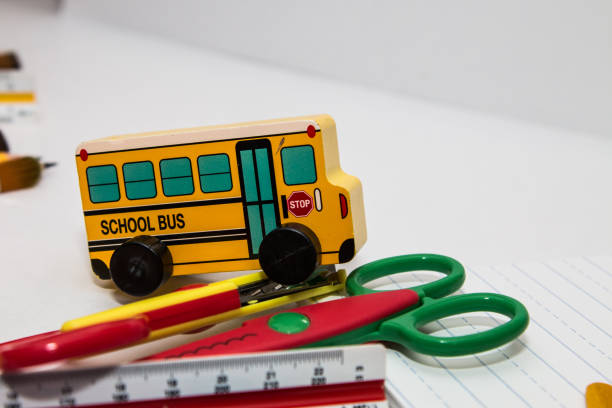 istock Yellow school bus toy vehicle 867228348