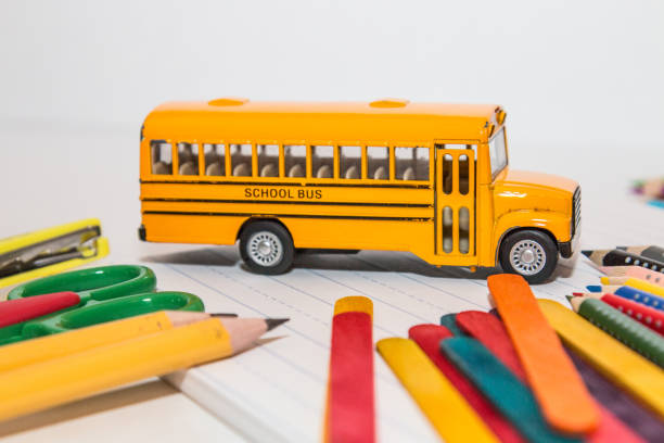 istock Yellow school bus toy vehicle 867228460