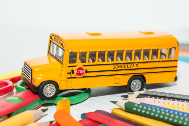 istock Yellow school bus toy vehicle 867228636