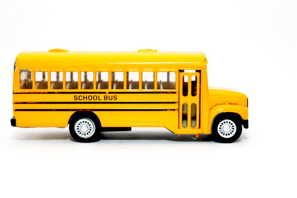 istock Yellow school bus toy vehicle 867228650