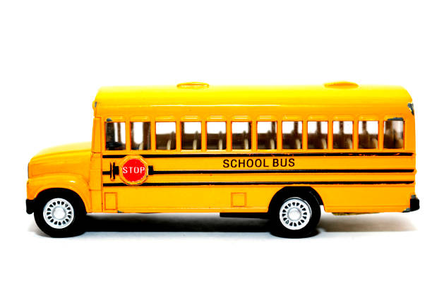 istock Yellow school bus toy vehicle 867228654