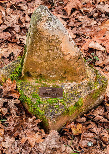 A lone tombstone or headstone marked \