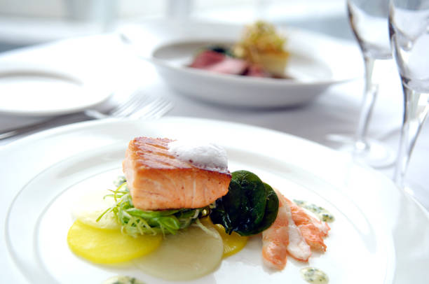 istock Gourmet Fried Salmon Dish with Shrimp and Vegetable Slices 867234922