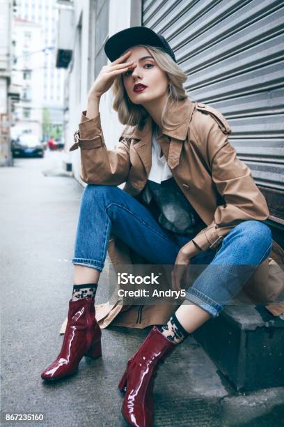 Beautiful Blonde Woman In A Coat Stock Photo - Download Image Now - Fashion, Street Style, Fashion Model