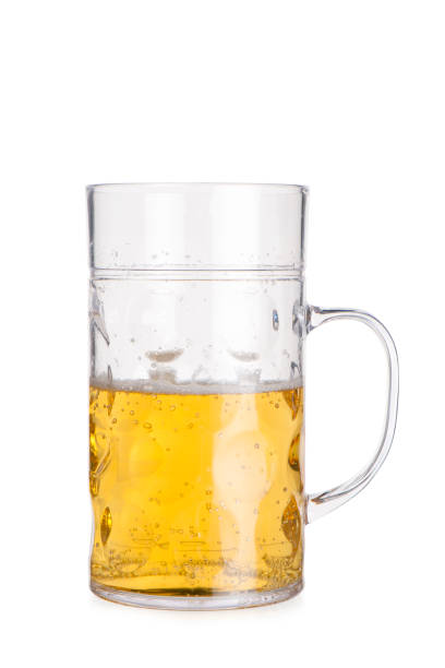 Cutout of a tall crystal mug half-filled with beer