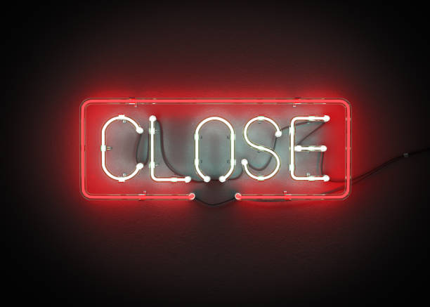 istock Close Sign made from neon alphabet on a black background. 867236172