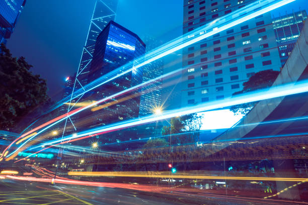istock traffic trails in downtown hong kong 867239152
