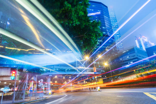 istock traffic trails in downtown hong kong 867239392