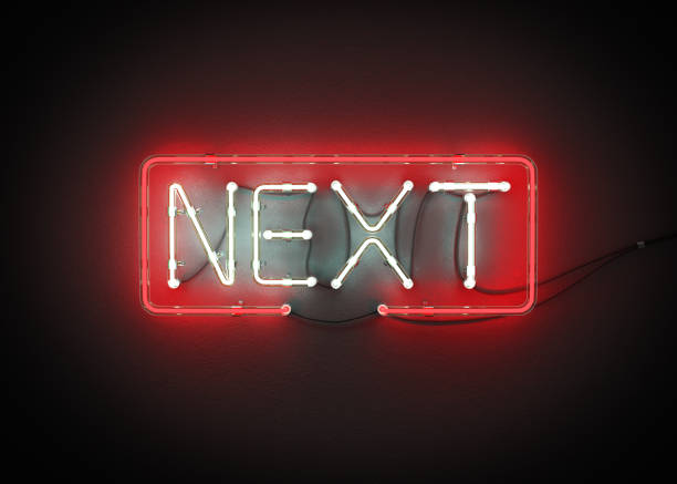 istock Next sign made from neon alphabet. 867244758