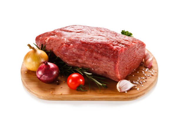 istock Raw beef on cutting board and vegetables 867245472