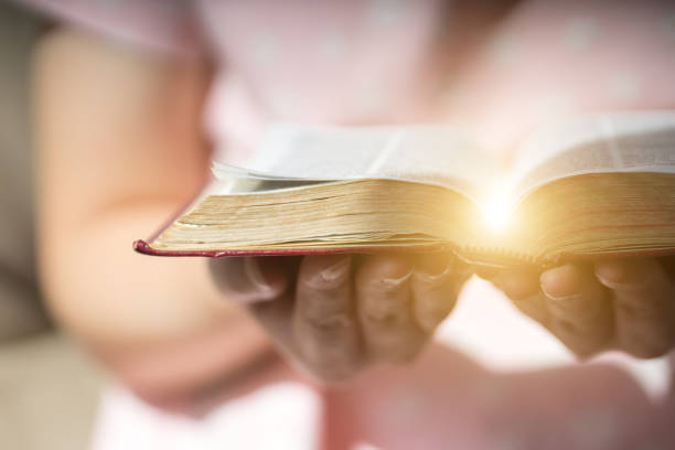 istock Women  Reading Holy bible. 867248160