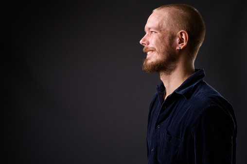 Studio Portrait Of Finnish Man Against Gray Background