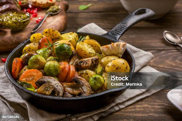Fried Potatoes With Vegetables Stock Photo - Download Image Now - Roasted, Vegetable, Backgrounds