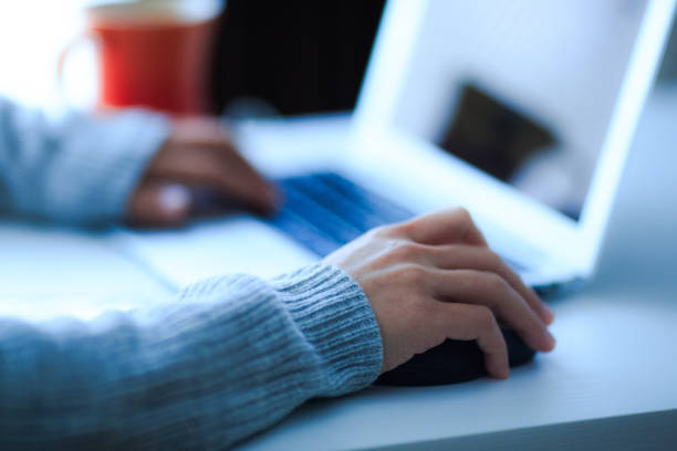 istock hands of women working on personal computers 867290470