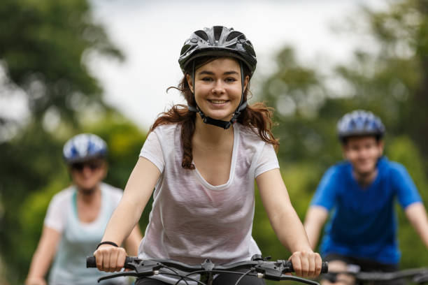 istock Urban biking- three people riding bikes in city 867291004
