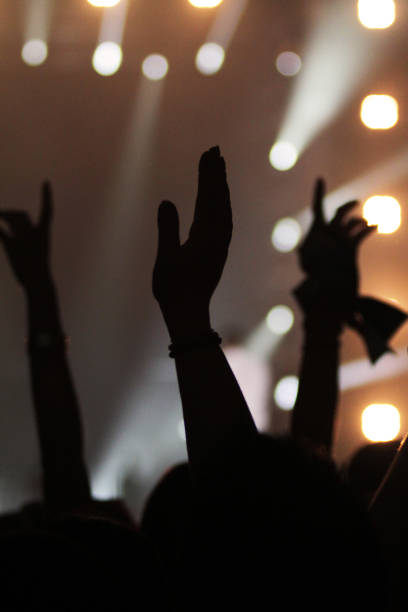 istock fan hands at live concert 867291238