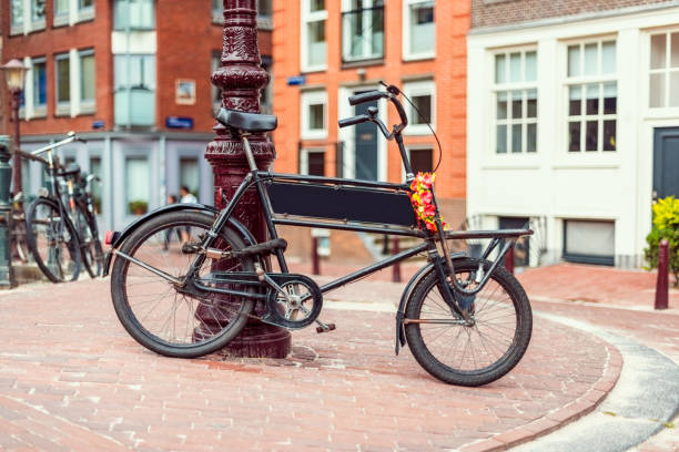 istock Bicycle parked against Street Light in Amsterdam Netherlands 867301346