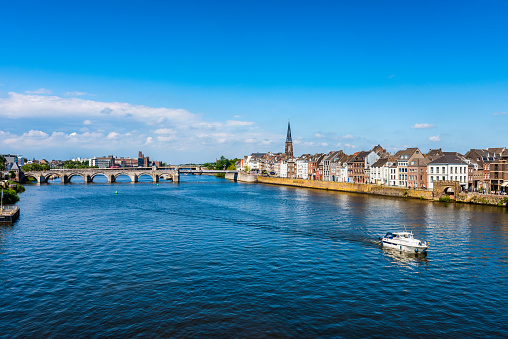 Maastricht Netherlands and Maas River on summer day.