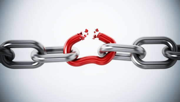 istock Broken red chain part among metal parts 867304638
