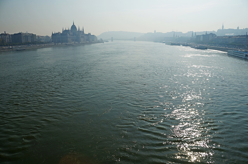 View of the building of the Parliament of Hungary. The Danube River.