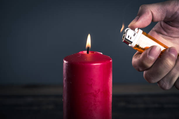 istock red candle and a man 867312534