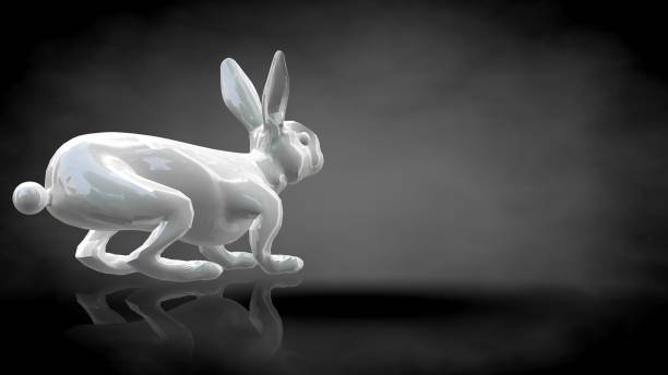 istock 3d rendering of a reflective rabbit on a dark black background 867315344